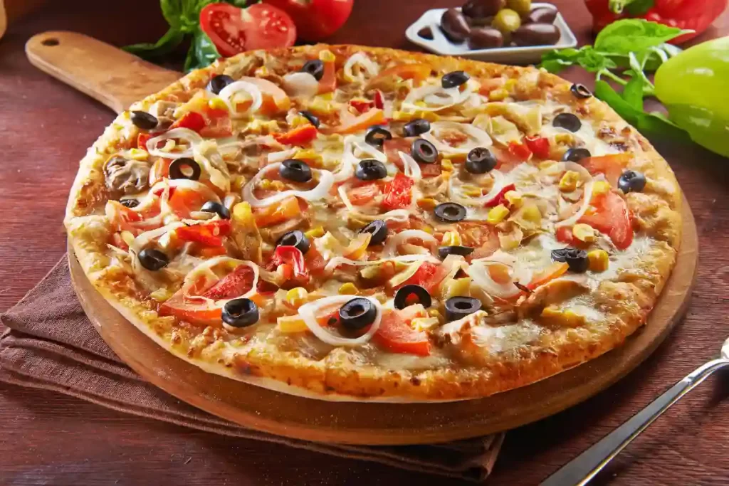 Aprenda a fazer pizza caseira com massa rápida, leve e cheia de sabor. Descubra dicas práticas, versão low carb e como conservar sua pizza por mais tempo